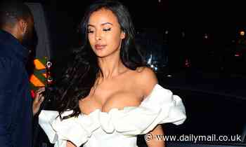 Maya Jama puts on a VERY racy display in tiny white ruffled mini dress