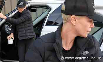 Charlize Theron ditches the glam routine as she runs errands in windbreaker