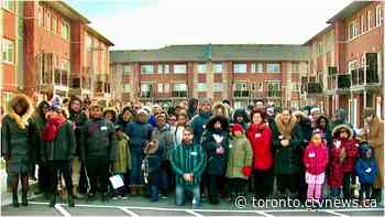 Twelve families move in to new homes at Habitat for Humanity site in Scarborough
