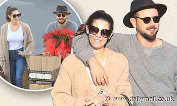 Ashley Greene looks besotted with her husband of one year as they pick up Poinsettia plants