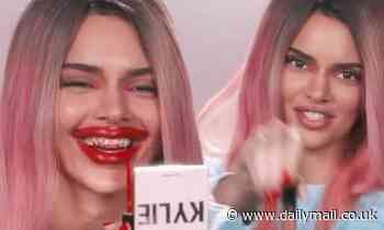 Kendall Jenner smears on gloss and mocks Kylie's inflated lips