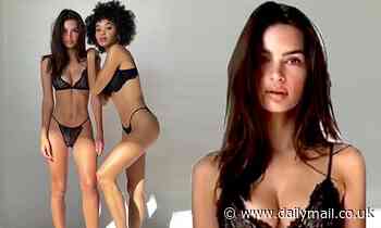 Emily Ratajkowski poses in lace lingerie with a fellow model