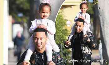 John Legend is every inch the family man as he gives his little girl Luna a ride on his shoulders