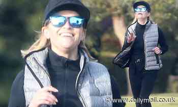 Reese Witherspoon goes for a jog after Women in Entertainment honor AND golden Globes nomination