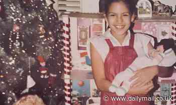 Eva Mendes is a mom in training as she tends to her toy dolls in heartwarming Christmas throwback