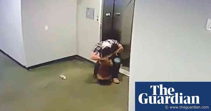 Man saves dog after leash gets caught in elevator door – video