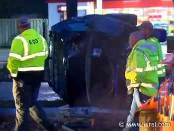 SUV flips on median near NC State, closing Western Blvd.