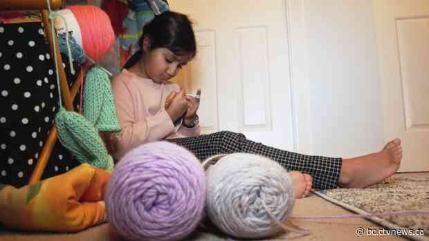 B.C. girl teaching class to knit hats for babies, food bank users