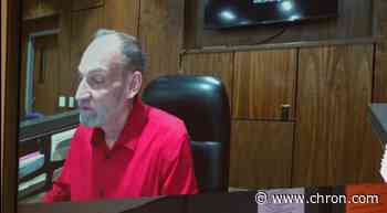 Suspect in officer's death held without bond after flap over initial bond amount