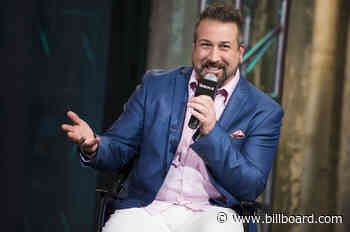 Watch *NSYNC's Joey Fatone Play Santa Claus & Surprise Fans With Ice Cream
