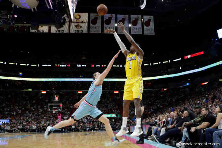 Lakers edge Heat for 13th straight road win