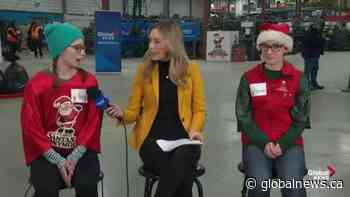 Chatting with some longtime volunteers from 630 CHED Santas Anonymous