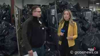 Peter Plaizier from 630 CHED Santas Anonymous on delivery day