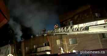 Montreal fire sends one to hospital as 100 firefighters battle sunrise blaze