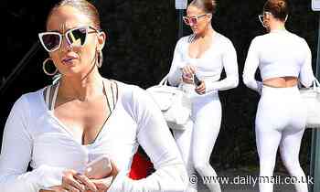 Jennifer Lopez shows off her beautiful booty in skin-tight white leggings as she hits the gym