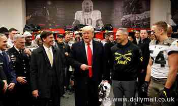 Donald Trump receives a huge ovation from 70,000 fans at Army-Navy football game