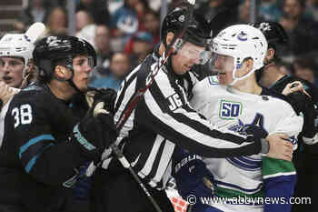 Sharks beat Canucks 4-2 to snap 6-game skid