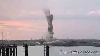 Towering chimney at power station on Thames demolished