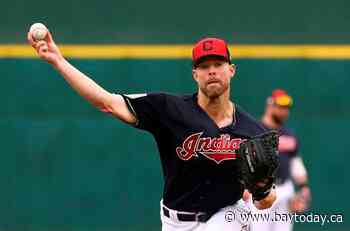 AP source: Indians close to trading ace Kluber to Rangers