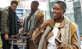 Joshua Jackson holds hands with a laughing Jodie Turner-Smith after Berlin trip