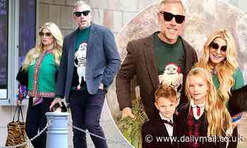 Jessica Simpson cuts a festive figure in an ornate coat with fur-trimmed sleeves