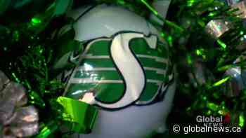 Fan celebrates holidays with Roughrider wreaths