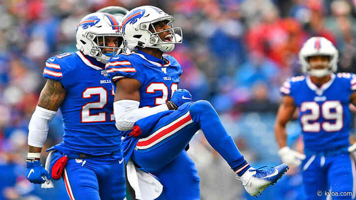 Wallace’s pick seals playoff trip for Bills