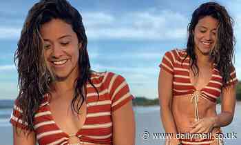 Gina Rodriguez flashes her toned tummy while modeling a bikini during vacation in Costa Rica