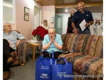 'I can't believe it': Grant Fuhr makes special delivery to Edmonton senior