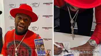 Floyd Mayweather Disses Manny Pacquiao at Autograph Signing, 'Victim 48!'