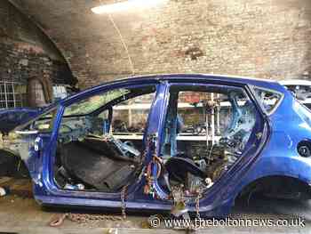 Police find cars and parts in raid on Tonge Moor 'chop shop'