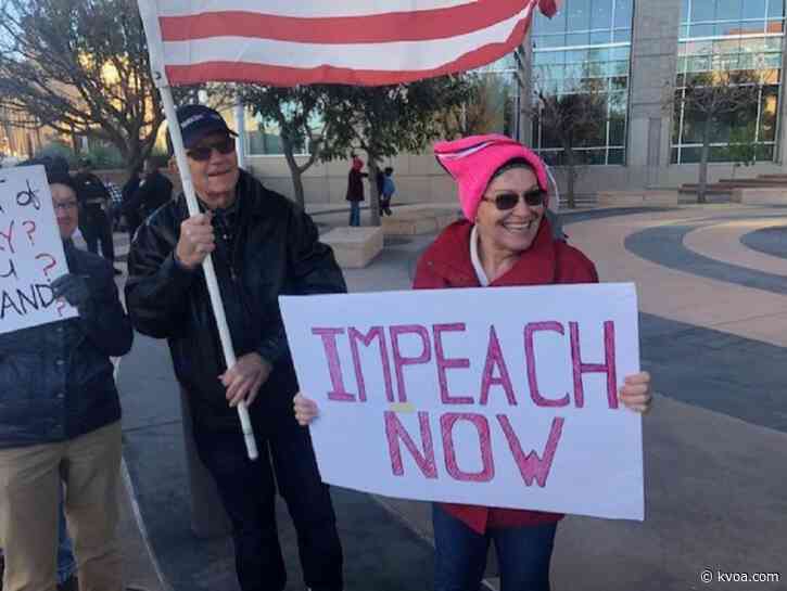 Thousands rally in downtown on eve of historic impeachment vote