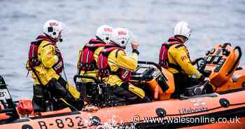 Four hour search in darkness to find two men and a dog missing at sea in freezing cold weather