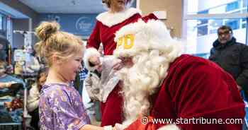 Police bring Christmas cheer to kids at St. Paul Children's Hospital