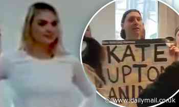 Kate Upton is branded 'murderer' by animal rights activists who barged into her fitness class
