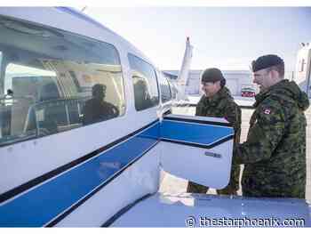 Retired police officers make special delivery of sports equipment for youth in Canoe Lake