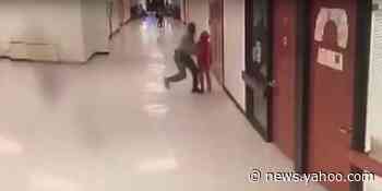 The sheriff's deputy seen slamming an 11-year-old onto the ground in a viral video has been charged with assault