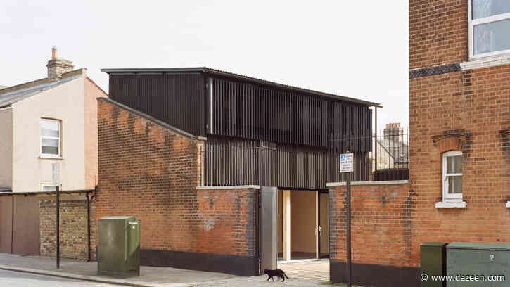 Russell Jones inserts small black home into Victorian outbuilding in London