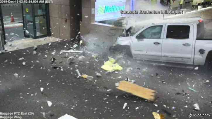 WATCH: Holiday travelers surprised by truck crashing through Florida airport