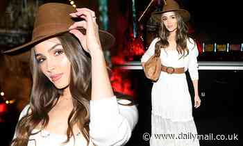 Olivia Culpo turns heads in a tiered maxi dress and fedora as she attends Riyadh music festival