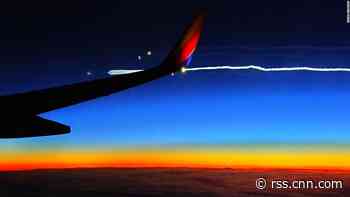 Passengers watch Boeing Starliner launch from airplane windows