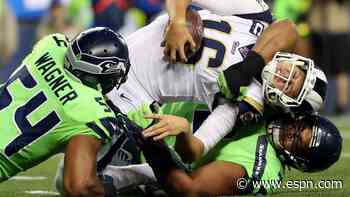 Seahawks DT Woods suspended four games