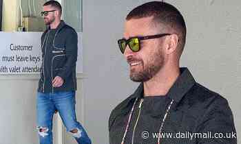 Justin Timberlake is seen back home in LA for the first time since his hand-holding scandal in NO