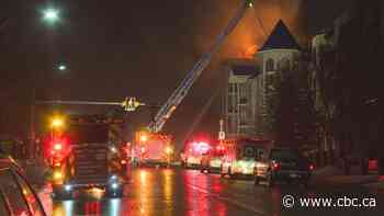 Calgary apartment complex 'completely engulfed' in flames, police say