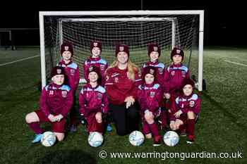 Junior football club gets new kit in time for Christmas