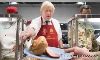 Boris Johnson serves lunch to British troops in Estonia