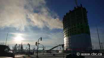 Low water supply, fiery debris: Crews still battling Pembina Highway apartment fire, nearly 12 hours later