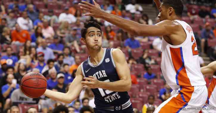 Sam Merrill’s 21 points help Utah State beat Florida 65-62, but Neemias Queta re-injured