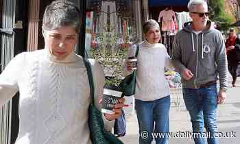 Selma Blair and boyfriend David Lyons put on a loved-up display as they head out for lunch