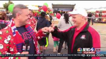 AZ Bowl helps kids again with toys at “Miracle En El Barrio”